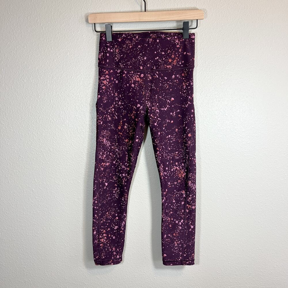 Athleta Ultimate Stash Pocket Crop Leggings Purple Splatter Size XS Capri9